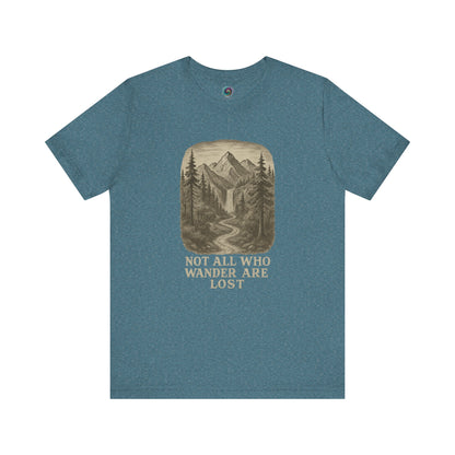 Heather deep teal “Not All Who Wander Are Lost T-Shirt – Tolkien Travel Tee for Nature Lovers” with outdoorsy mountain and waterfall illustration