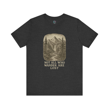 Dark grey heather “Not All Who Wander Are Lost T-Shirt – Tolkien Travel Tee for Nature Lovers” with sketch-style forest and mountain print
