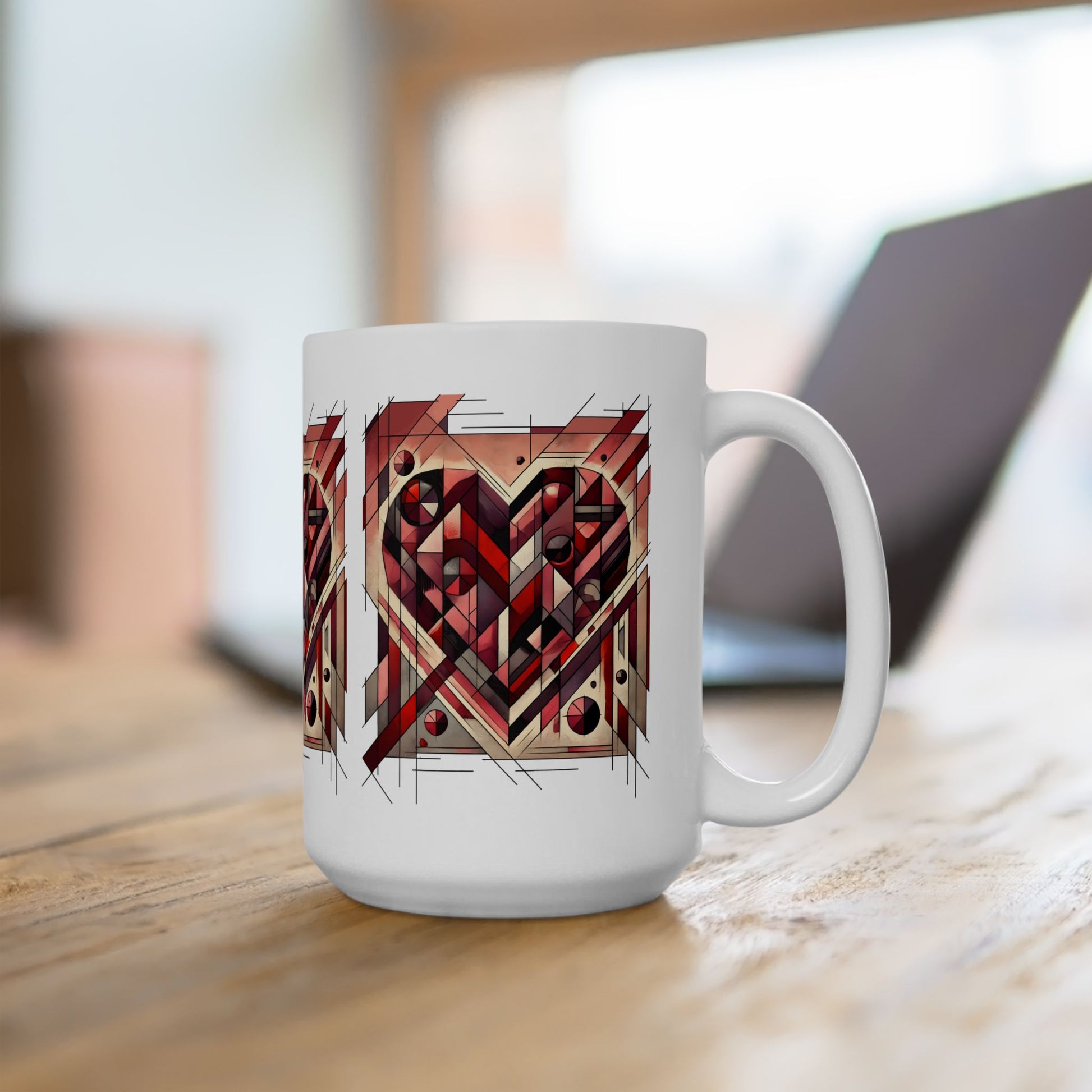 Cubist Heart Mug – Modern Art Valentine's Day Ceramic Coffee Cup (11oz/15oz) photographed in a bright office setting, featuring a cubist heart graphic that adds artistic character to everyday coffee breaks.
