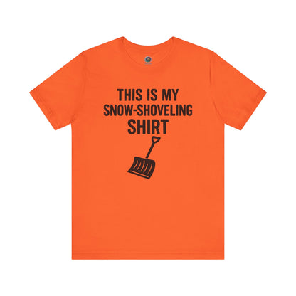 This Is My Snow Shoveling Shirt – Funny Winter Chore Tee in Orange, featuring the playful winter message and shovel icon clearly printed.
