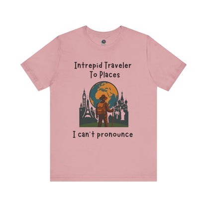 Pink t-shirt with travel-themed graphic and text on a white background for jet-setters and globe-trotters