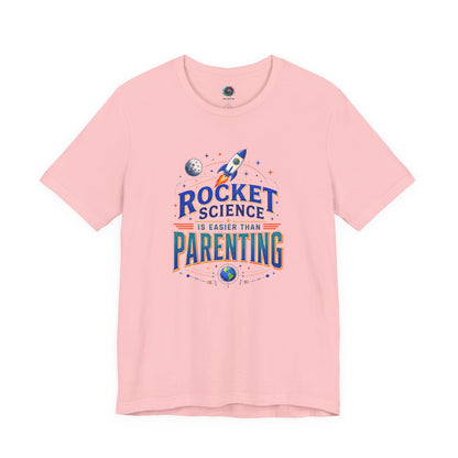 Rocket Science Parenting T-Shirt – Funny Aerospace Parent Tee on pink with funny parenting humor for moms, dads, engineers, and space fans.