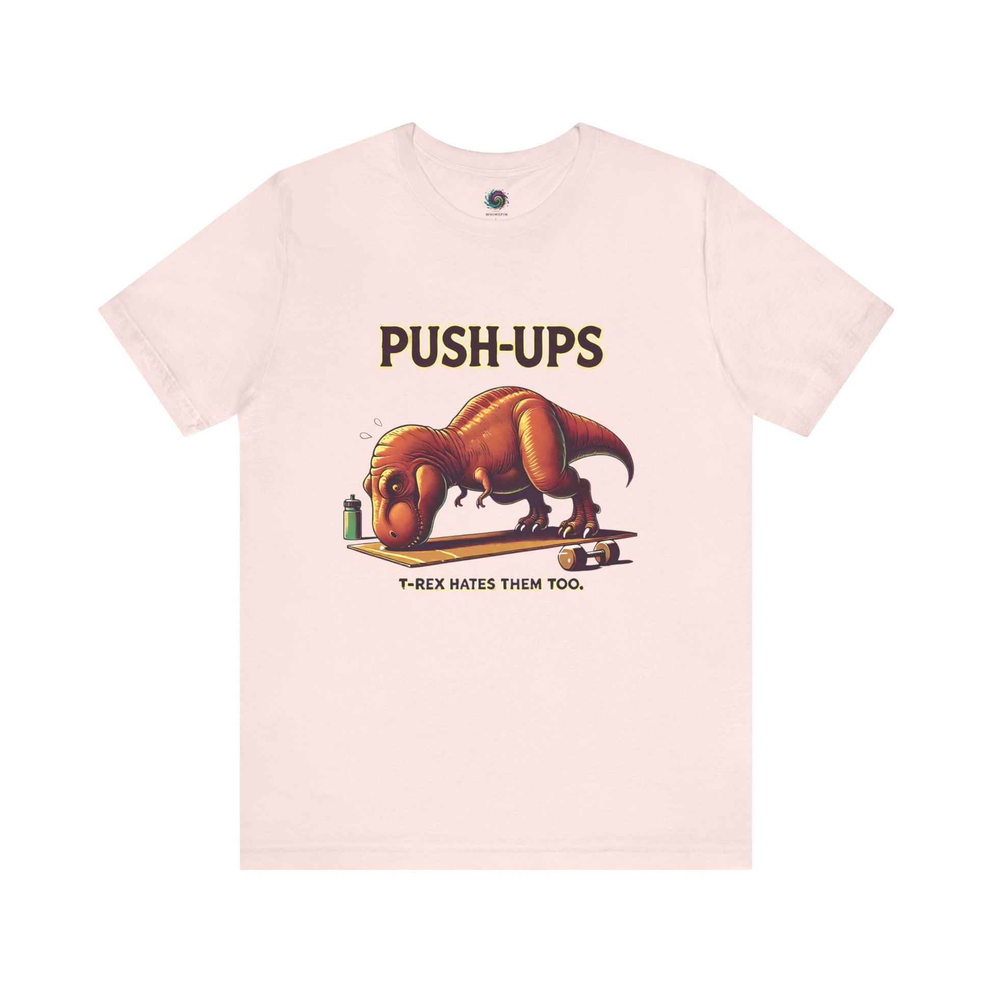 T-Rex Push-Up T-Shirt – Funny Dinosaur Workout Graphic Tee in soft pink with a cute yet fierce t rex hates push ups joke for quirky gym-goers.