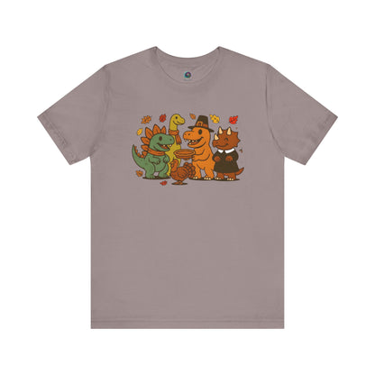 Thanksgiving Dinosaur T-Shirt – Funny Dino Thanksgiving Tee in earthy pebble brown, featuring adorable dinosaurs and a turkey in autumn tones.