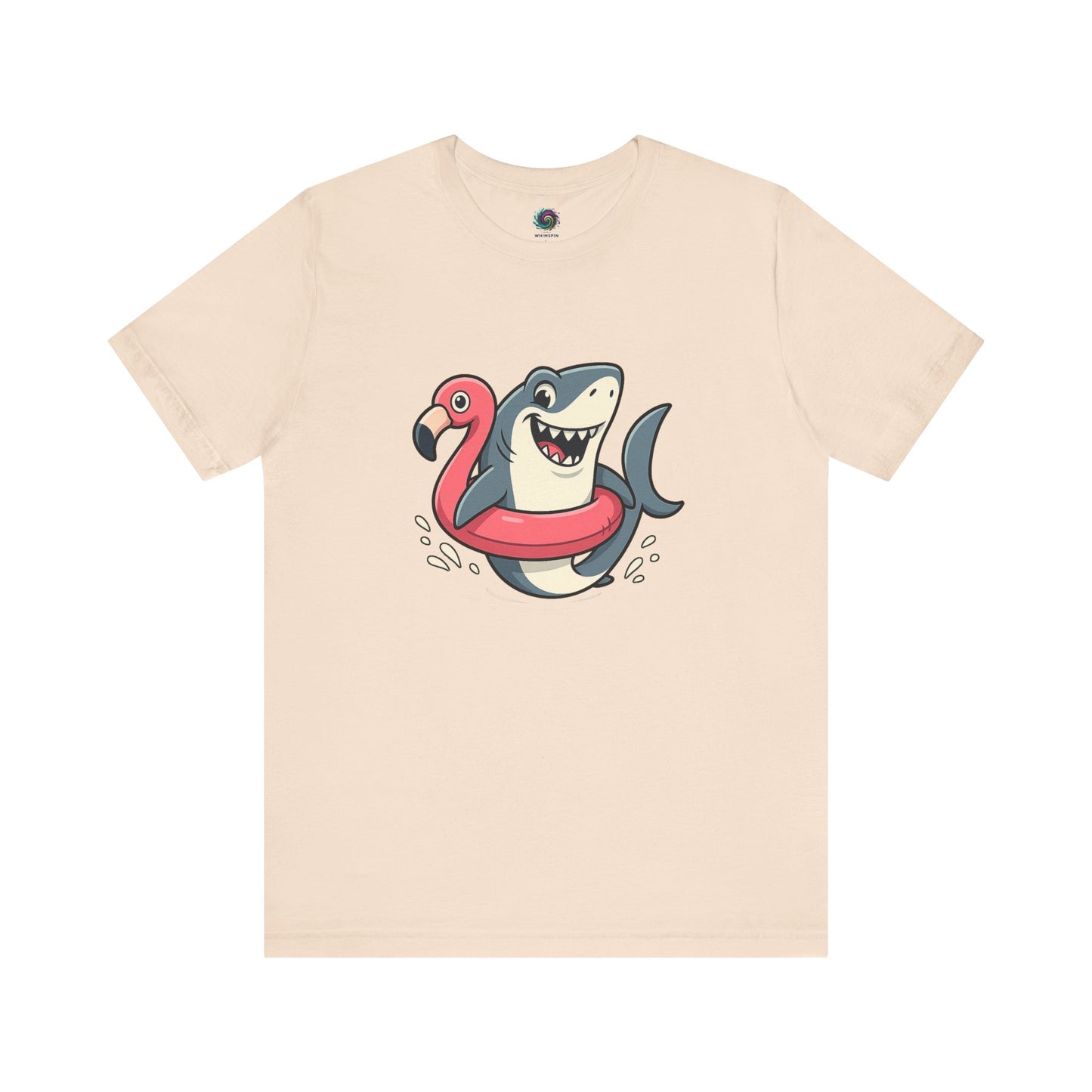 Shark Flamingo Floatie T-Shirt – Funny Beach & Pool Day Tee in soft cream with lighthearted cartoon of shark in floatie