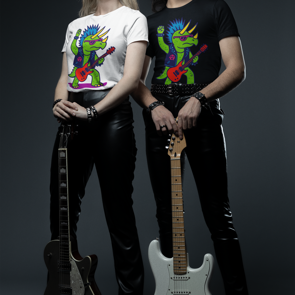 Punk Rock Triceratops T-Shirt – Funny Dinosaur Tee for Adults styled on a duo, highlighting the bold triceratops rocker design in both black and white shirts for edgy, music-inspired fashion.