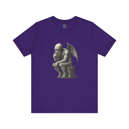 The Thinker Cthulhu Shirt – Lovecraftian Funny T-Shirt Unisex Graphic Tee in team purple featuring a clever funny Cthulhu shirt design in statue pose.