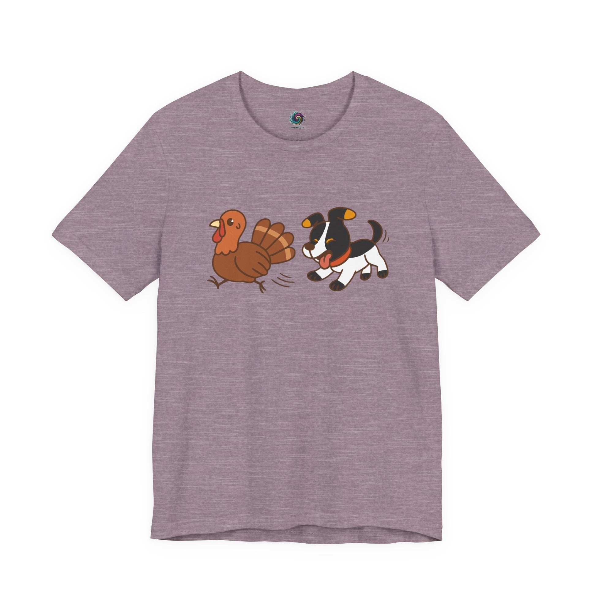 Dog Chasing Turkey T-Shirt – Funny Thanksgiving Dog Tee in heather purple with playful dog and turkey print