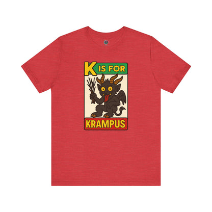 K is for Krampus Alphabet Holiday Graphic T-Shirt in Heather Red flat lay with colorful alphabet monster design