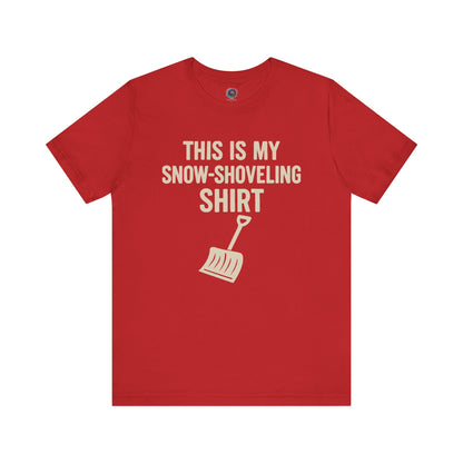 This Is My Snow Shoveling Shirt – Funny Winter Chore Tee in Red, showcasing the bold white typography and minimalist shovel design.