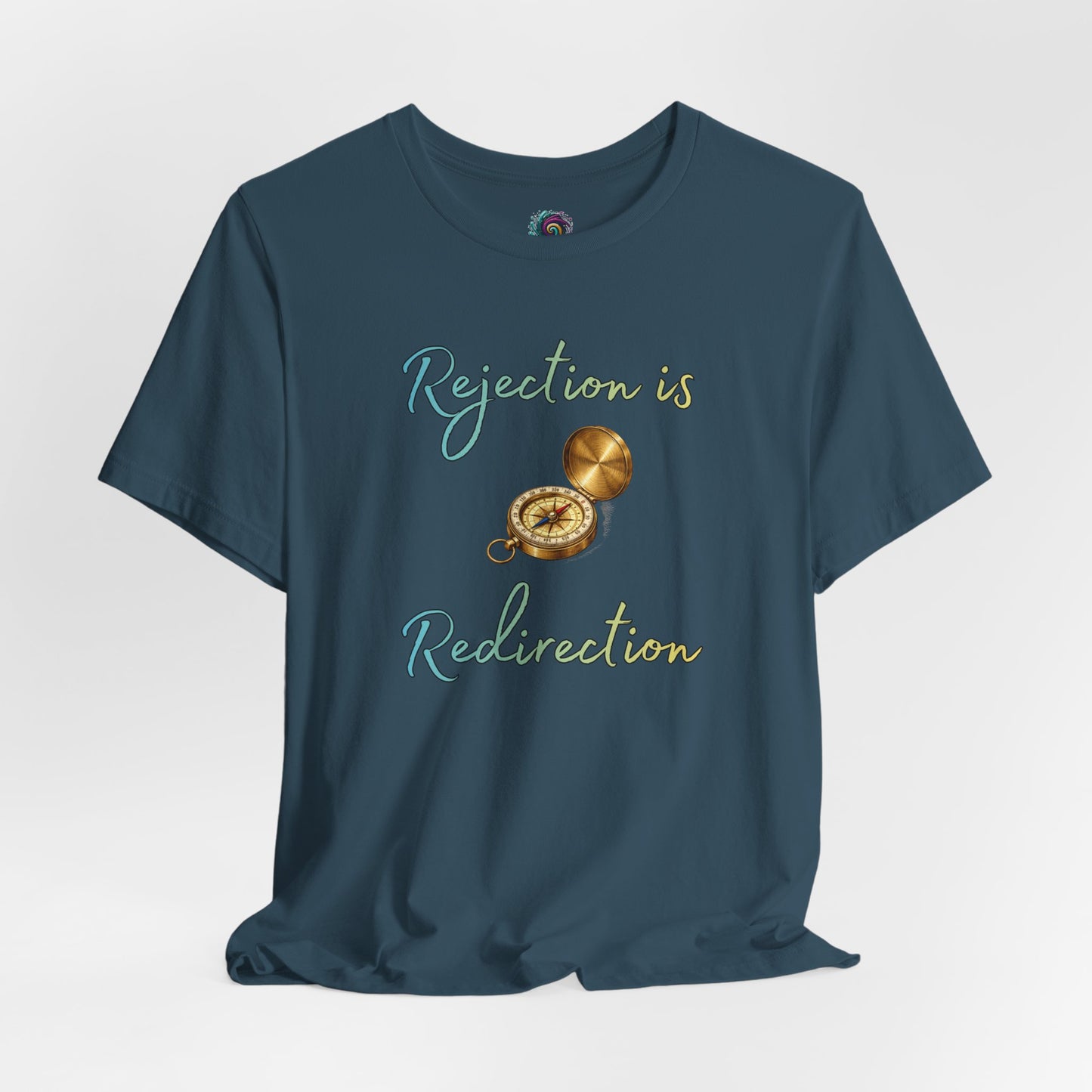 Rejection Is Redirection T-Shirt – Motivational Compass Quote Tee in deep teal showcasing the motivational redirection message with a compass design