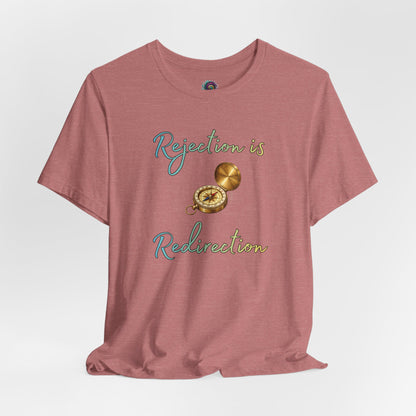 Rejection Is Redirection T-Shirt – Motivational Compass Quote Tee in heather mauve featuring the rejection is redirection shirt lettering and compass design