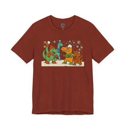 the Dinosaur Snowball Fight T-Shirt – Funny Winter Dino Graphic Tee in Rust, combining a warm seasonal color with winter dino humor.