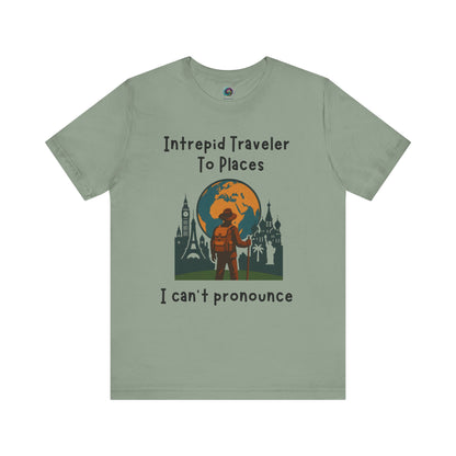 Green t-shirt with travel-themed design and text on a white background