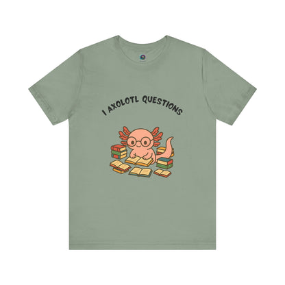 Sage Green I Axolotl Questions T-Shirt from WhimSpin - a cute axolotl wearing glasses is reading a book and is surrounded by piles of books, the Words "I Axolotl Questions" is over the image