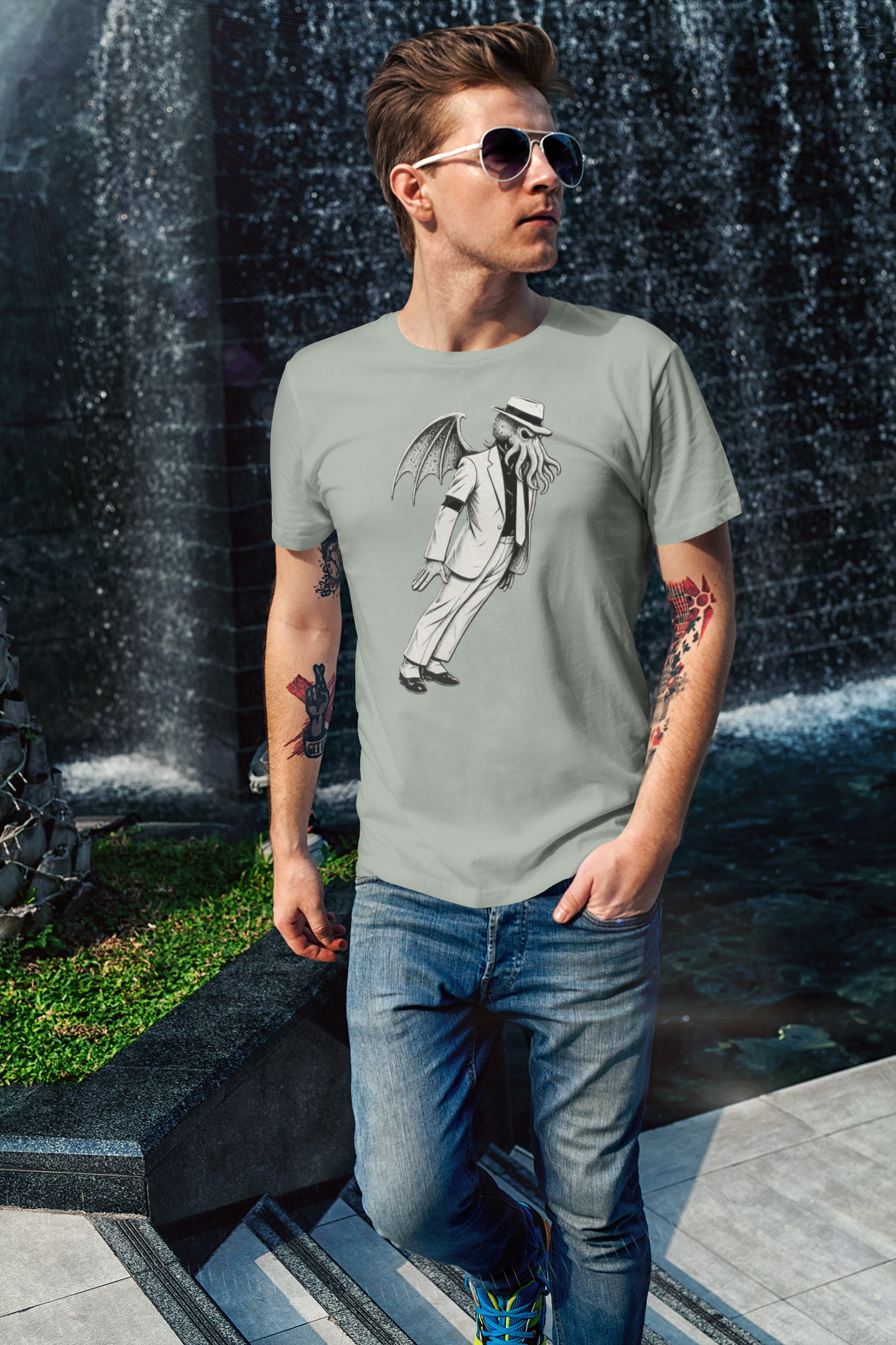 Smooth Cthulhu Unisex T-Shirt – Lovecraft Meets Smooth Criminal Style in sage, lifestyle outdoor look, Smooth Cthulhu mash-up of cosmic horror and pop legend.