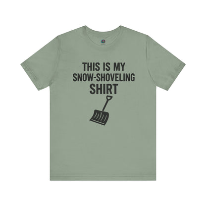 This Is My Snow Shoveling Shirt – Funny Winter Chore Tee in Sage, highlighting the minimalist shovel illustration and seasonal humor.