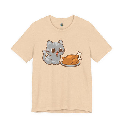Thanksgiving Cat T-Shirt – Cute Hungry Cat and Turkey Tee in heather sand dune with big-eyed cat fixated on turkey dinner