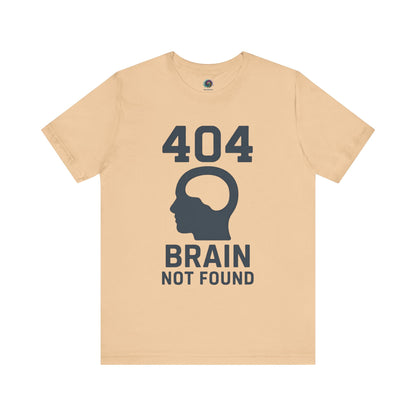 Sand dune "404 Brain Not Found T-Shirt" from WhimSpin. The tshirt graphic is a profile image of a human head with an empty hole where the brain should be and the text "404 Brain Not Found."