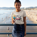 Woman holding ice cream cone on the boardwalk wearing the Shark Flamingo Floatie T-Shirt – Funny Beach & Pool Day Tee