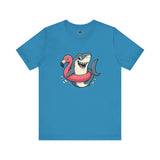 Shark Flamingo Floatie T-Shirt – Funny Beach & Pool Day Tee in aqua with cartoon shark and flamingo pool float graphic