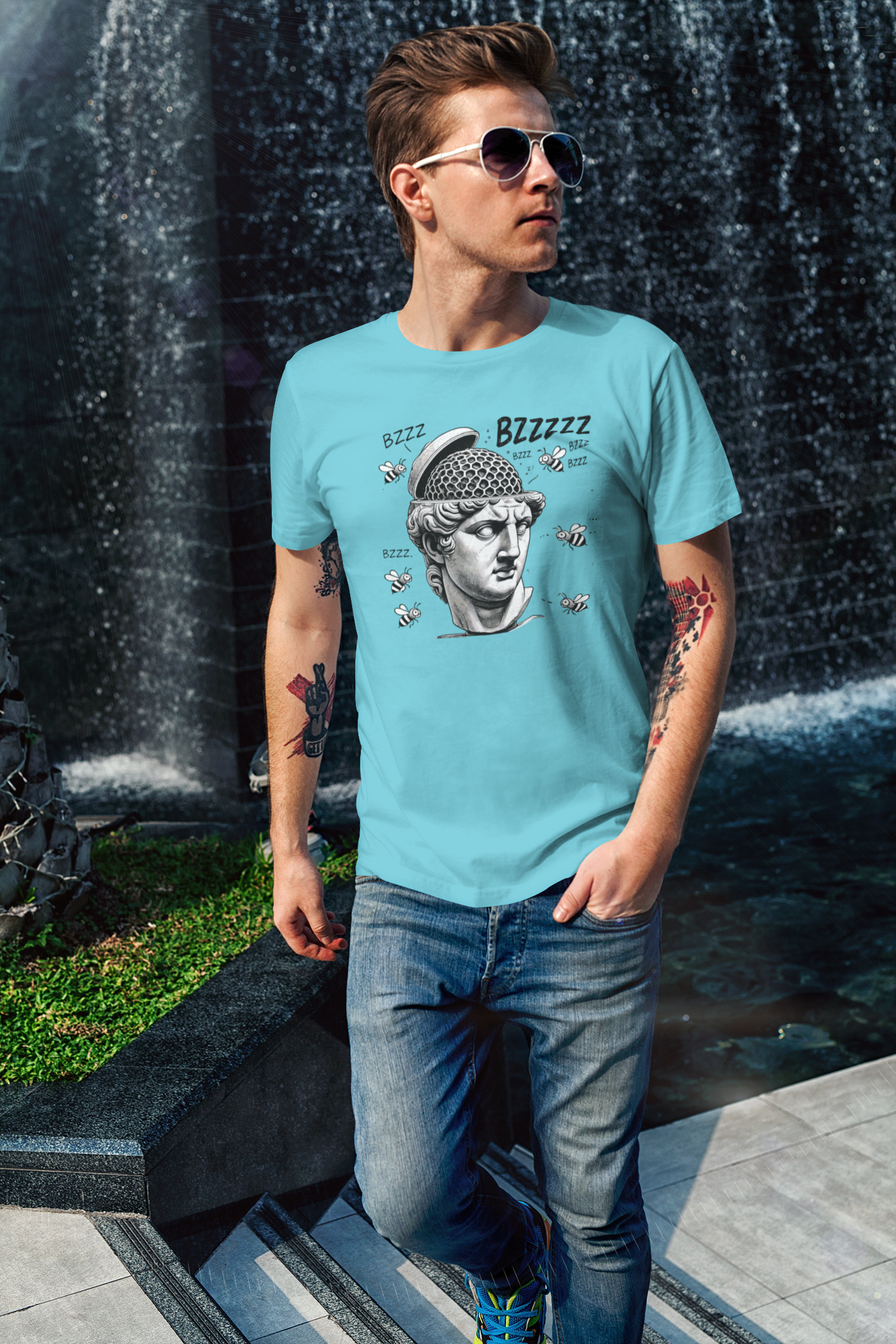 Hive Mind T-Shirt – Surreal Bee Group Think Parody Tee shown on man in turquoise shirt in outdoor setting