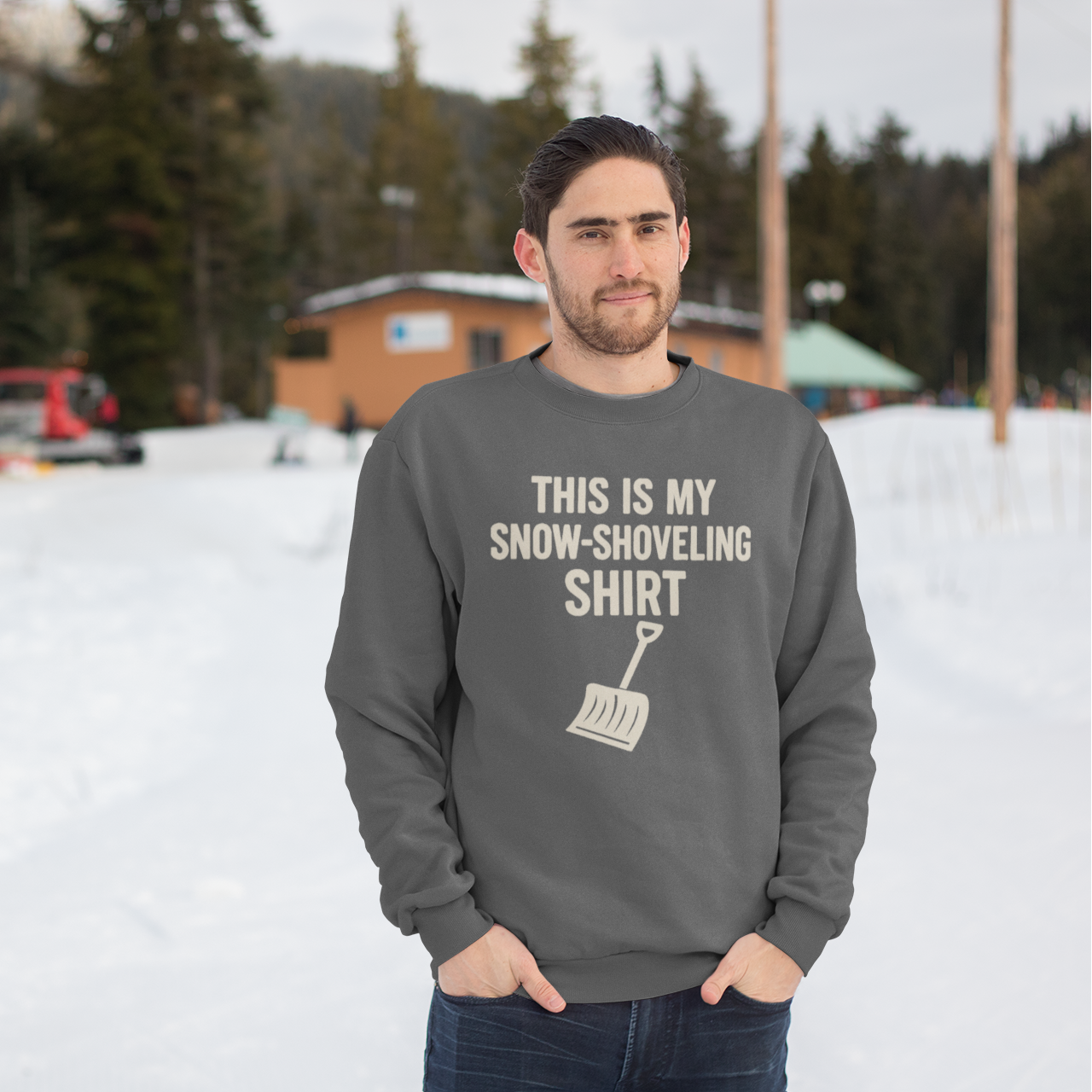 This Is My Snow-Shoveling Shirt – Funny Winter Chore Sweatshirt worn outdoors near winter cabins, capturing a relaxed cold-weather look during a snowstorm