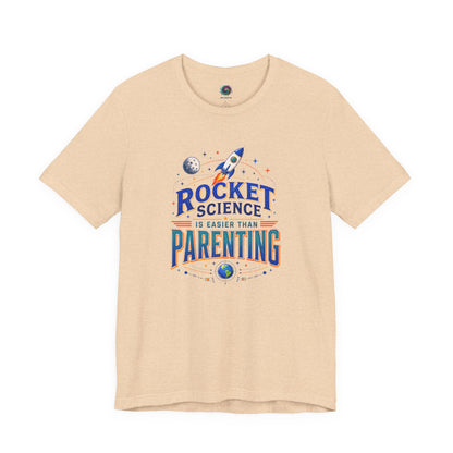 Rocket Science Parenting T-Shirt – Funny Aerospace Parent Tee on heather sand dune with a warm neutral look for aerospace and NASA fans.