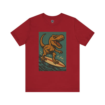 Surfing T-Rex T-Shirt – Funny Dinosaur Graphic Tee in canvas red, combining dinosaur surfing fun with eye-catching vacation style.
