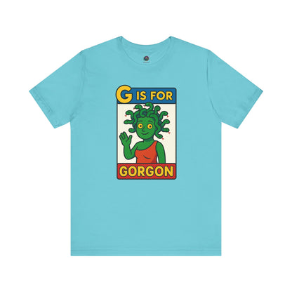 Turquoise G is for Gorgon tee, whimsical gorgon head illustration in alphabet card layout, halloween gorgon shirt.