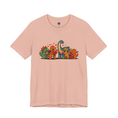 Dinosaur Valentines T-Shirt – Cute Dino Valentine’s Day Tee in Peach showcasing cheerful dinosaur valentine characters in a soft, warm hue