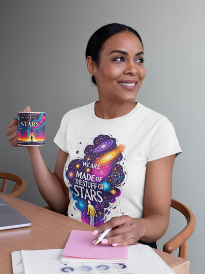 We Are Made of Star Stuff T-Shirt – Cosmic Galaxy Tee Shirt in white worn by a woman holding the matching mug, ideal Carl Sagan shirt for stargazers, thinkers, and dreamers.