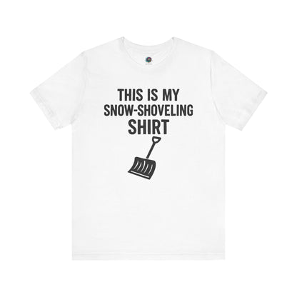 This Is My Snow Shoveling Shirt – Funny Winter Chore Tee in White, featuring dark text and shovel illustration with a simple winter look