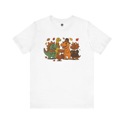 Thanksgiving Dinosaur T-Shirt – Funny Dino Thanksgiving Tee in classic white, showcasing a colorful group of dinosaurs celebrating Thanksgiving.