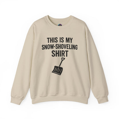This Is My Snow-Shoveling Shirt – Funny Winter Chore Sweatshirt displayed in sand layflat for cozy winter weather wear