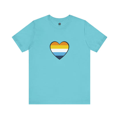 Light Blue AroAce Flag Heart T-shirt from WhimSpin. The shirt is blue with a heart drawn in the center made up of dark orange, light orange, white, turquoise, and navy blue stripes. 