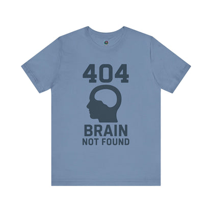 blue  "404 Brain Not Found T-Shirt" from WhimSpin. The tshirt graphic is a profile image of a human head with an empty hole where the brain should be and the text "404 Brain Not Found."