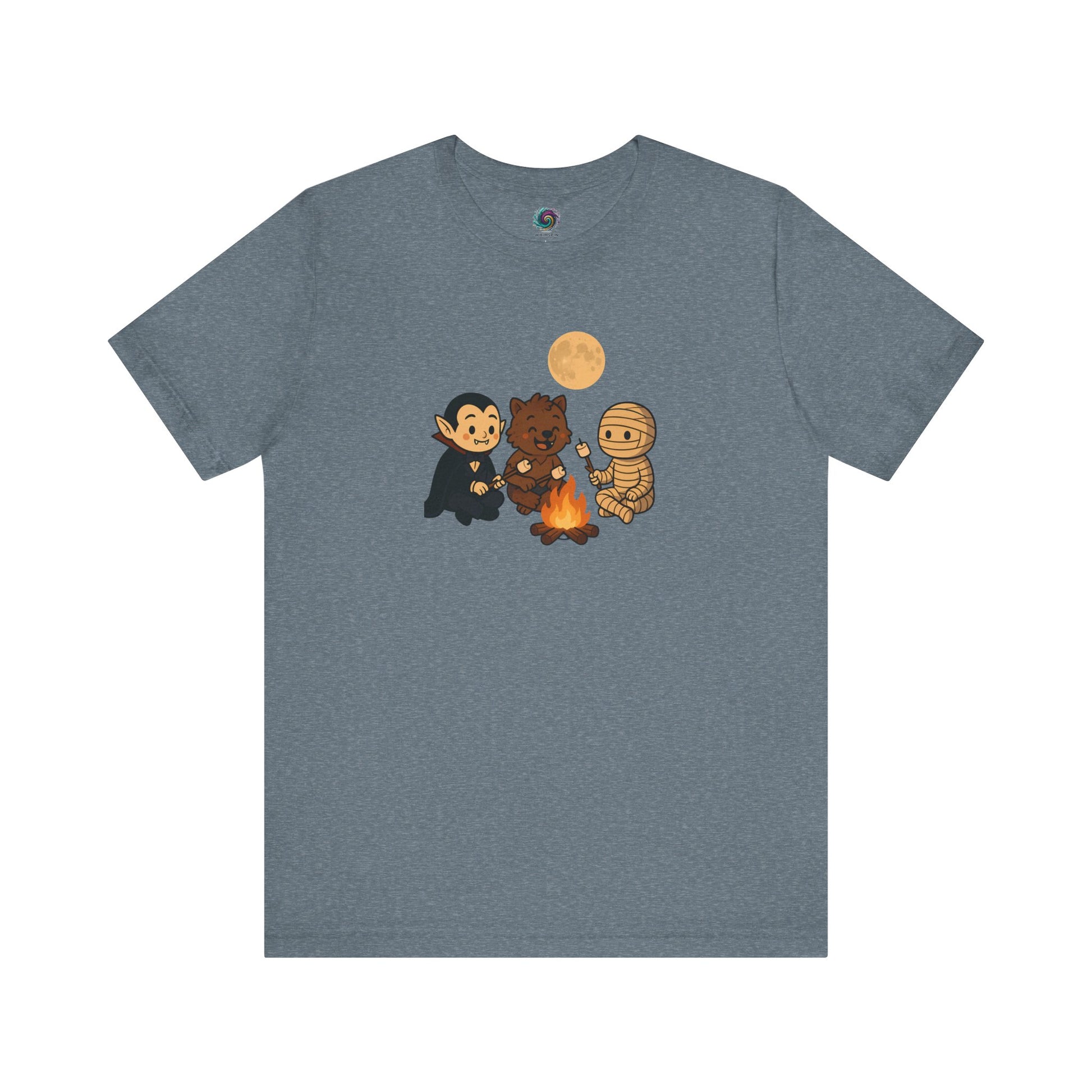 Flat lay of the Heather Slate Halloween Monsters Campfire T-Shirt showing friendly Halloween characters gathered around a cozy campfire with marshmallows.