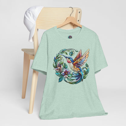 Stained Glass Hummingbird T-Shirt – Colorful Floral Bird Graphic Tee in heather prism mint featuring a stained glass hummingbird and ring of leaves and flowers