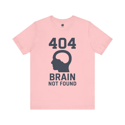 pink "404 Brain Not Found T-Shirt" from WhimSpin. The tshirt graphic is a profile image of a human head with an empty hole where the brain should be and the text "404 Brain Not Found."
