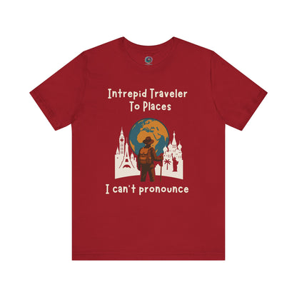 Red t-shirt with travel-themed graphic and text on a white background for world travelers