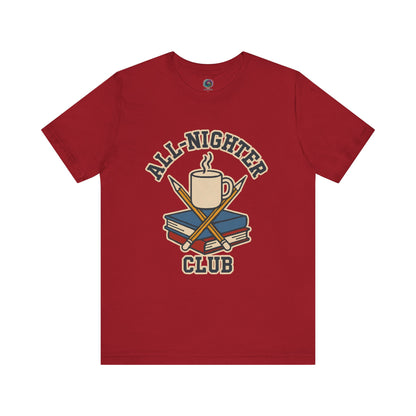 Red t-shirt with 'All-Nighter Club' graphic design featuring a mug, books, and crossed sticks on a white background. All-Nighter Club T-Shirt – Funny Caffeine & Study Tee for Night Owls