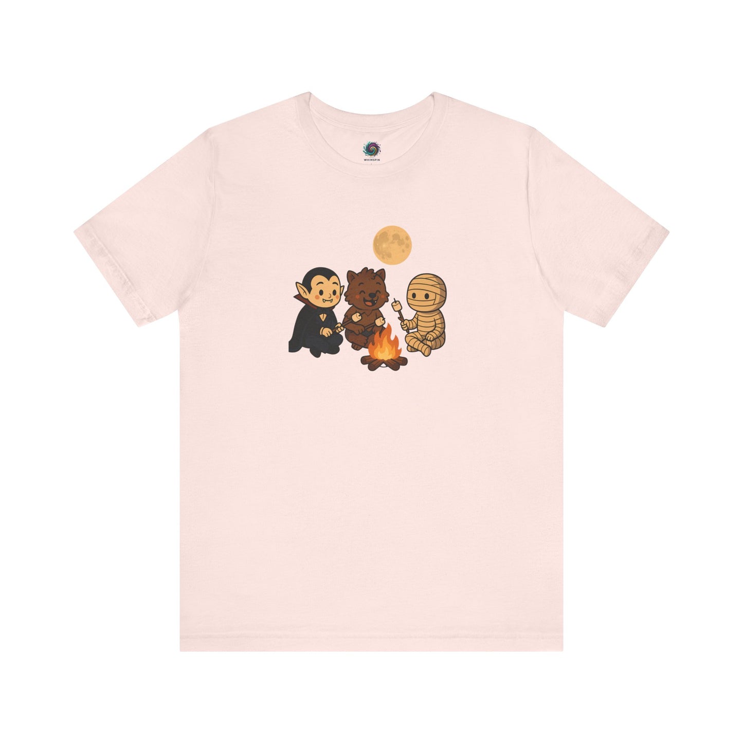 Halloween Monsters Campfire T-Shirt in soft pink by WhimSpin, featuring a cute monster campfire scene with marshmallows and a glowing moon.