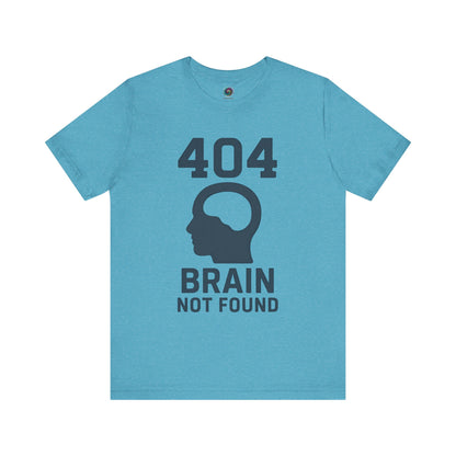turquoise  "404 Brain Not Found T-Shirt" from WhimSpin. The tshirt graphic is a profile image of a human head with an empty hole where the brain should be and the text "404 Brain Not Found."